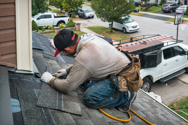 Professional Roofing technician working in Glen Oaks, NY